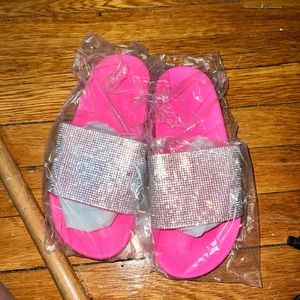 Never worn pink slides